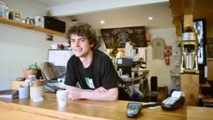 minimum wage coffee worker in Seattle
