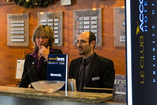 reception desk at a hotel - front desk workers were underpaid by marriot